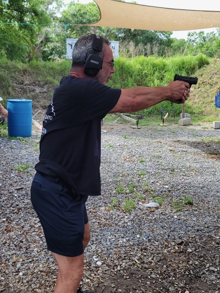 Gun instructor teaching shooting lessons in North Palm Beach Florida