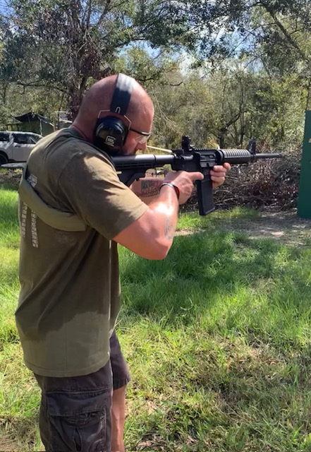 Gun instructor teaching shooting lessons in Buenaventura Lakes Florida