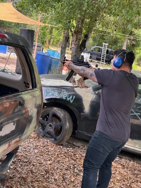 Gun instructor teaching shooting lessons in Fort Drum Florida