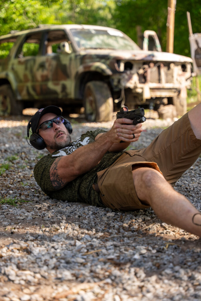 mike shooting from a laying position